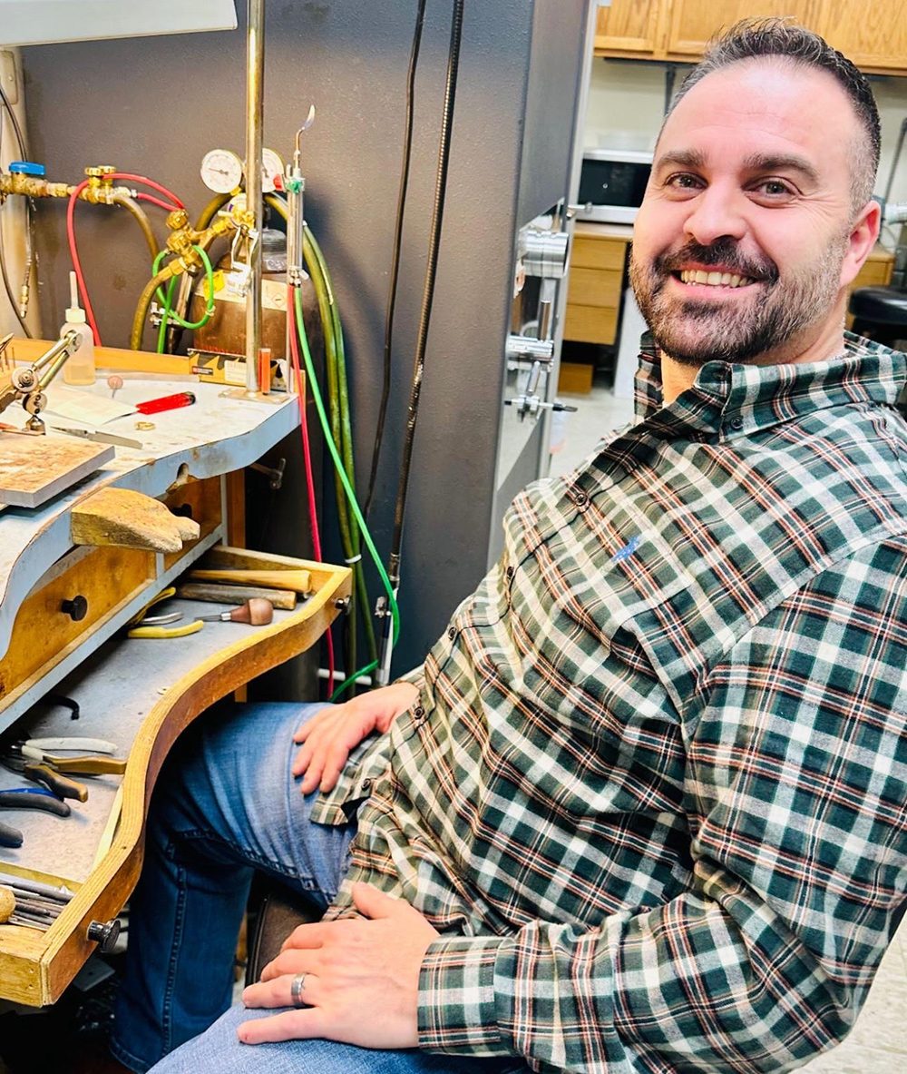 Jeweler at his bench at 14 Karat Jewelers in Livonia